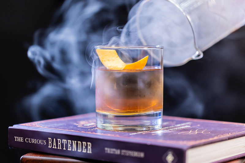 Smoked cinnamon old fashioned cocktail